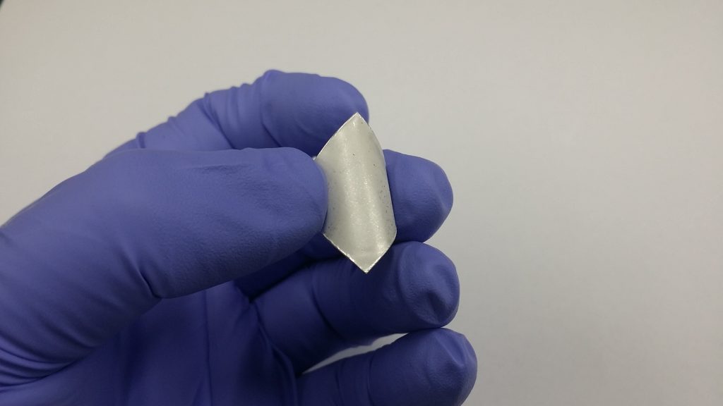 A photograph of a flexible PVDF-Gn film after it was peeled off.