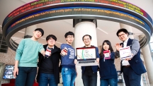 The SIMAPLE Startup team is posing for a group photo in front of LED Stock Ticker Board at Business Administration Bldg., UNIST. From left are Sung Joe Kim, YeongSeok Kim, SeungHoon Lee, KyungHoon Kim, SunHwa Lee, and Han Lee.