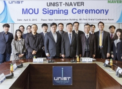 Attendees from the signing ceremony of MOU between UNIST and NAVER Corp. are posing for a group photo at UNIST.