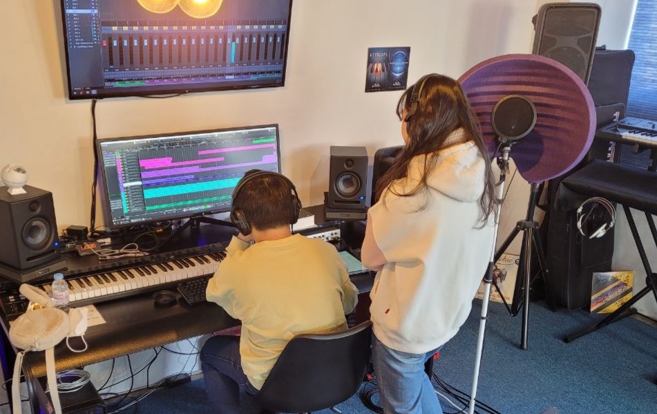 Recording acappella at the school recording studio | Image Credit: Pitch High